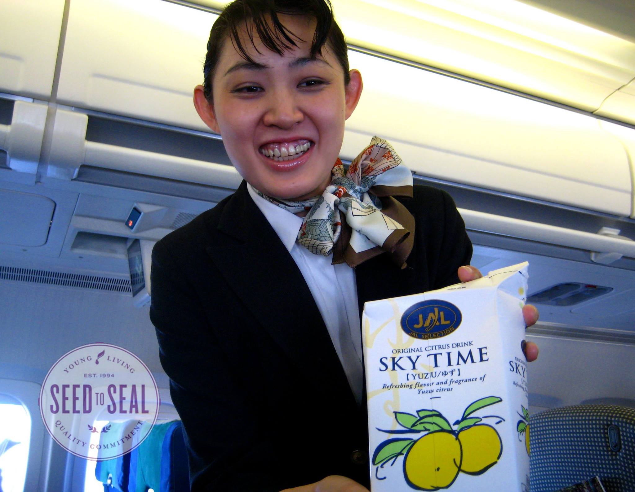 ANA stewardess serves yuzu juice